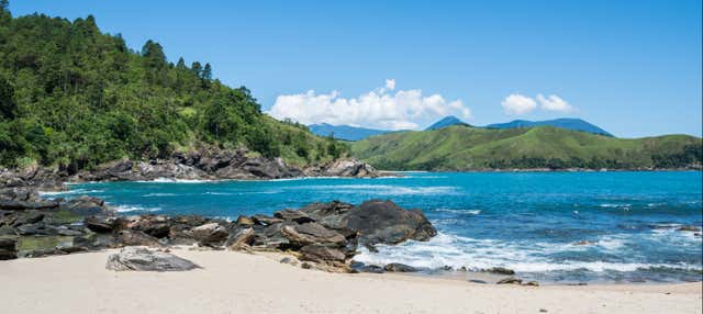 Discesa in corda doppia sulla spiaggia di Pauba
