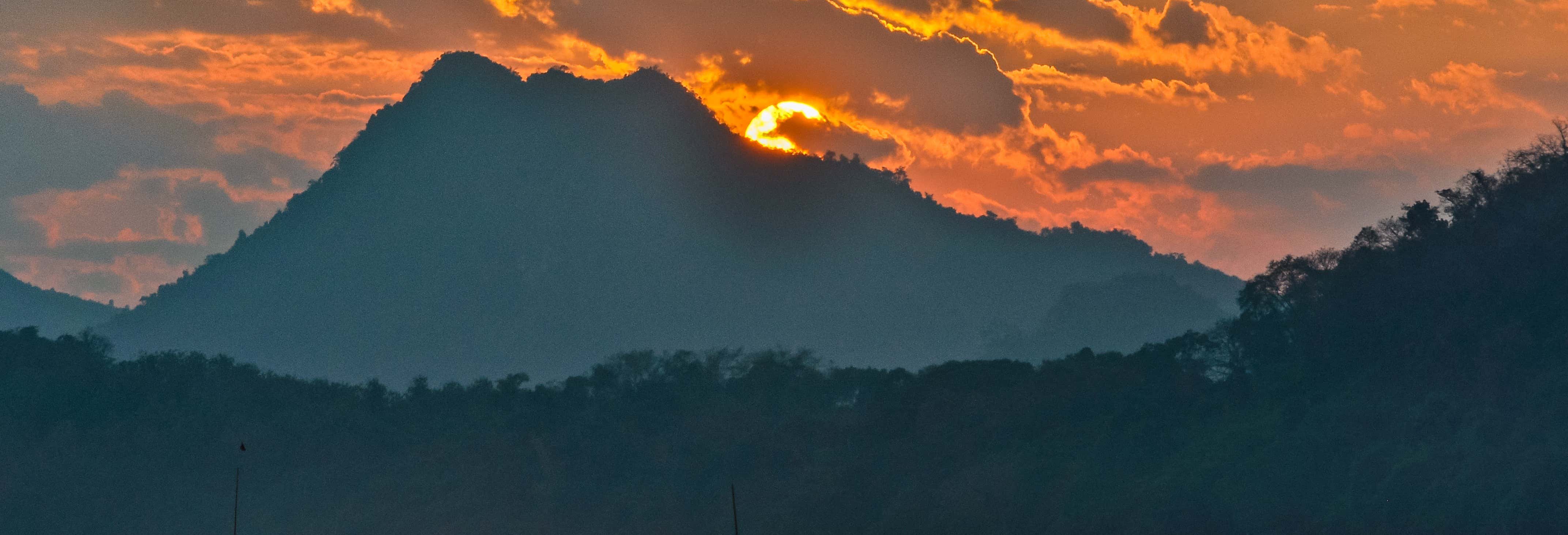 Giro in barca al tramonto sul fiume Mekong