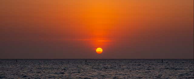 Paseo en barco al atardecer por la bahía de Barú