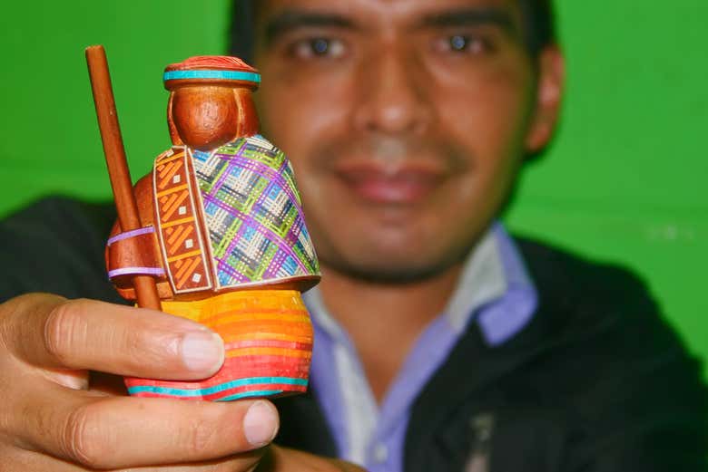 Craftsman showing one of his works of art - Craftsman showing one of his works of art