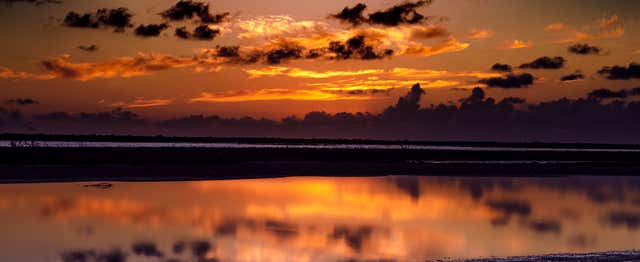 Balade en bateau au coucher du soleil avec apéritif