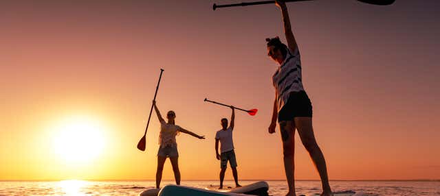 Paddle surf al atardecer en Cala Biniancolla