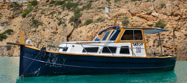 Giro in barca privata a Cala Bassa e isola Conejera