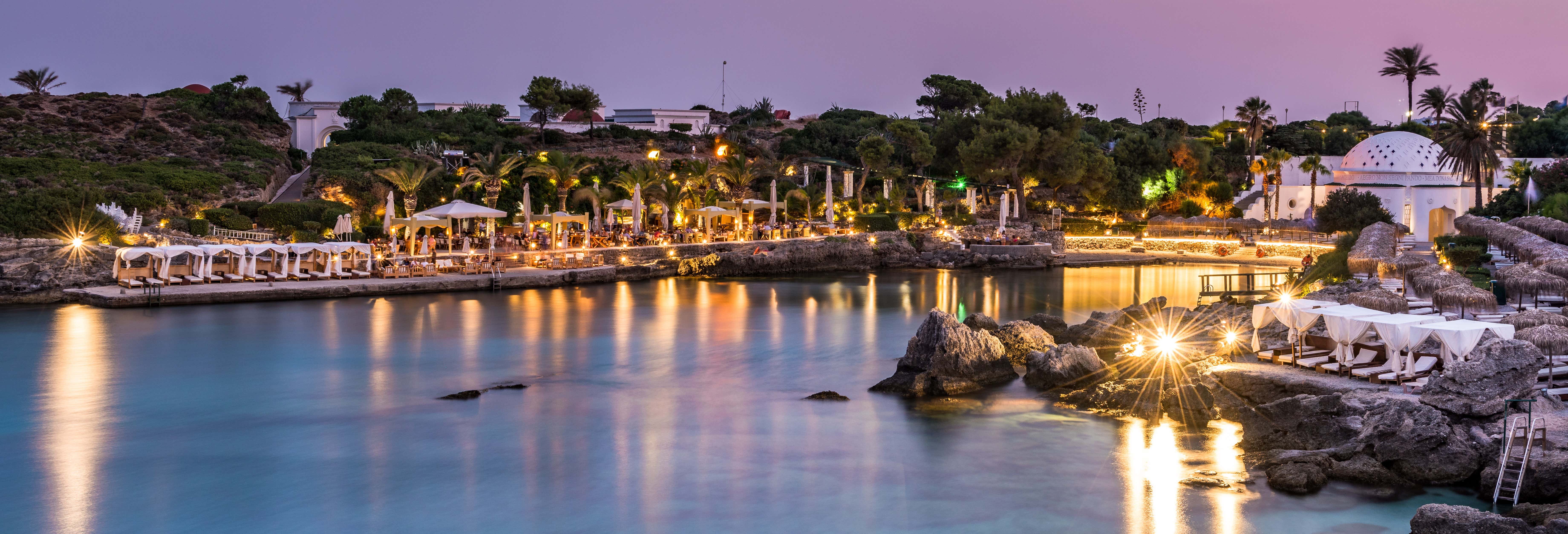 Giro in catamarano al tramonto con cena