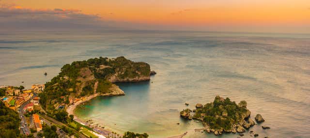 Giro in barca lungo la costa di Taormina al tramonto