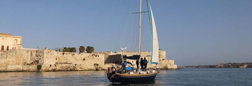 Giro in barca a Punta del Gigante con snorkeling