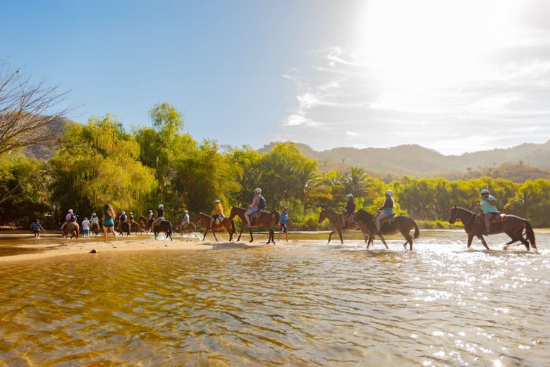Paseo a caballo por la ribera del río La Puerta + Kayak