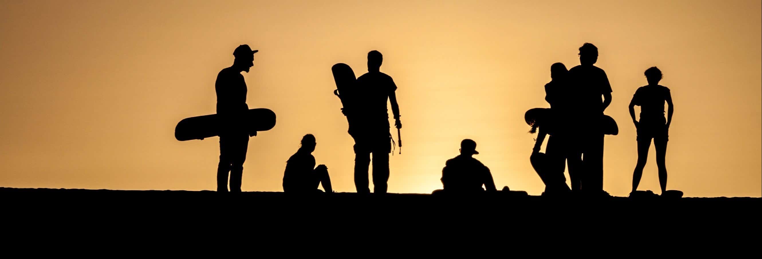 Sandboarding nel deserto di Ica al tramonto