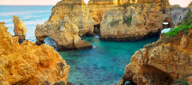 Tour in barca al tramonto nella grotta di Benagil