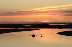 Passeio de barco pela Ria Formosa ao entardecer